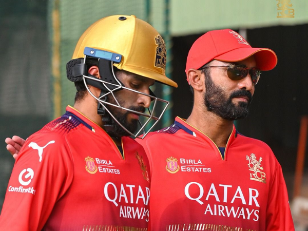 Rajat Patidar with RCB mentor Dinesh Karthik