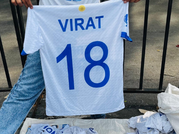 Replicas of Virat Kohli's Test jersey being sold outside Chinnaswamy ahead of RCB vs KKR match