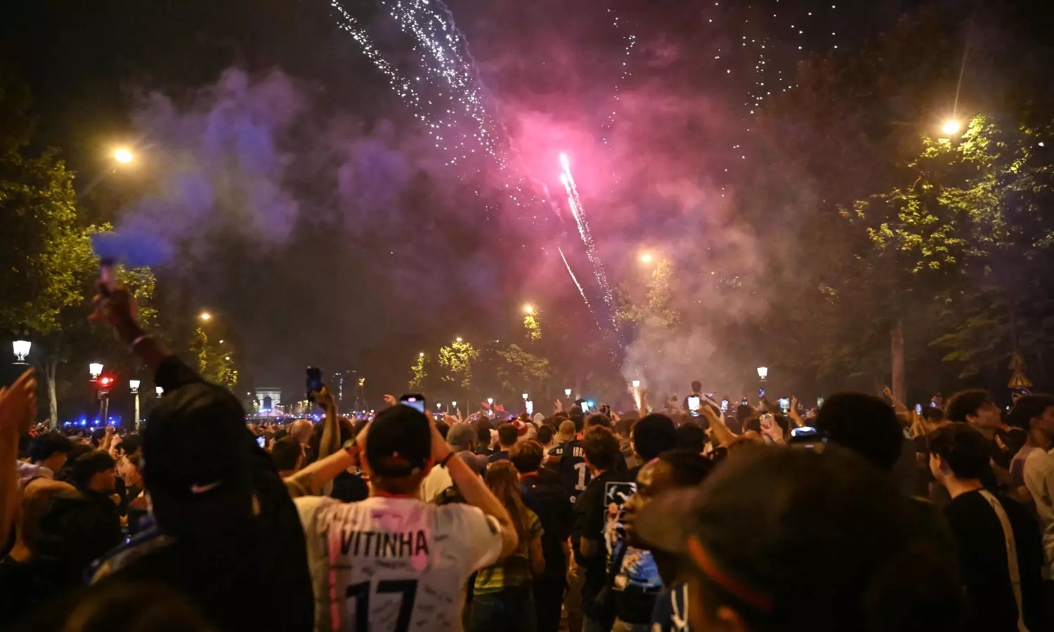 PSG fans celebrating the Champions League title victory