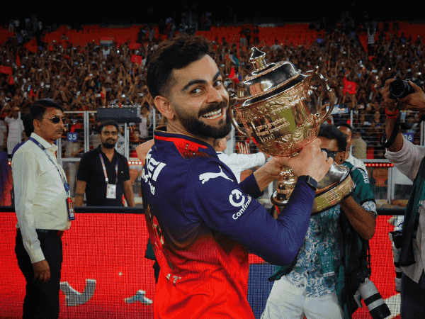 Virat Kohli with his maiden IPL trophy