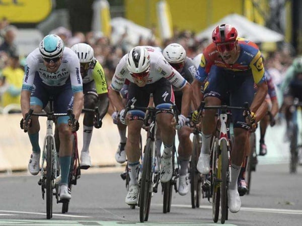 Belgian rider Tim Merlier won the third stage of the Tour de France in a photo finish