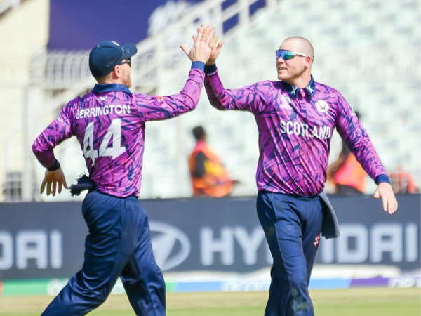 Scotland's Michael Leask (R) and skipper Richie Berrington