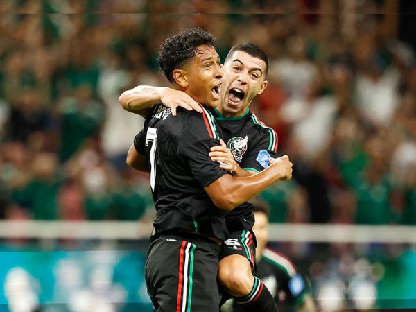 Mexico players celebrating a goal in Group A match against South Korea