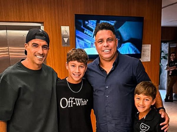 Luis Suarez with Brazil legend Ronaldo Nazario