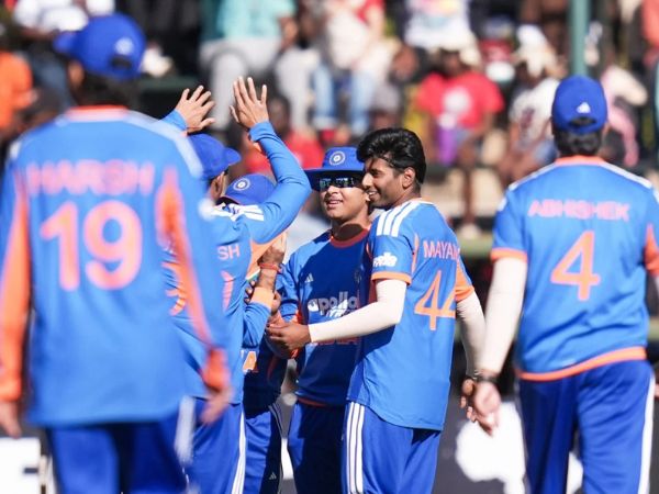 Indian players celebrate after taking a wicket against Zimbabwe in the 3rd T20I at Harare