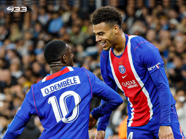 Paris Saint-Germain players Ousmane Dembele and Desire Doue celebrating