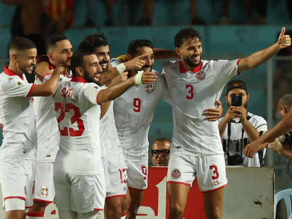Tunisia football players after a victory over Equatorial Guinea