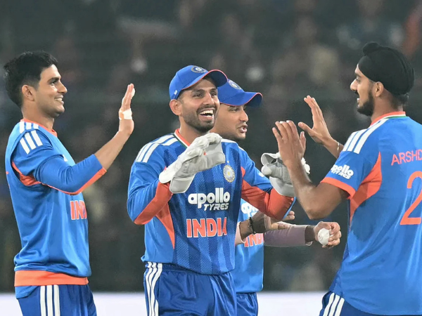 Shubman Gill, Jitesh Sharma, and Arshdeep Singh celebrate after taking a wicket