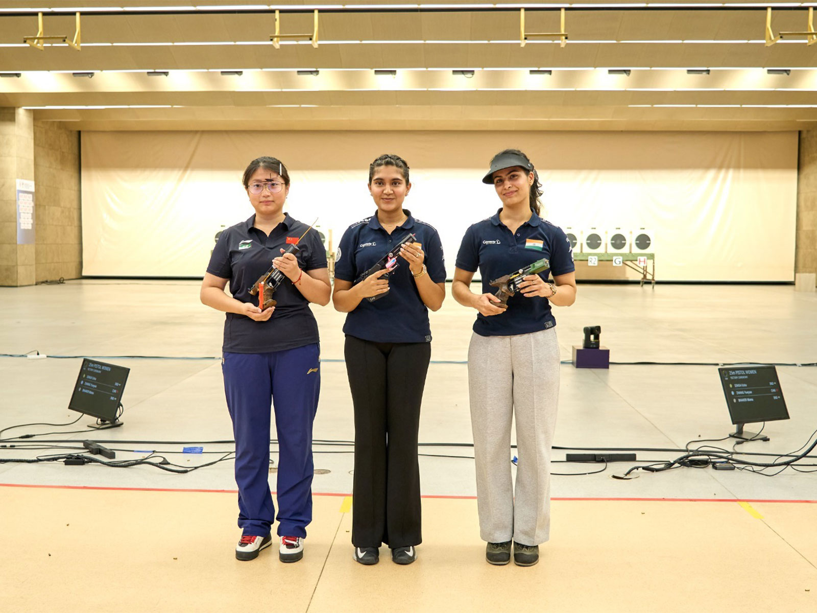 Esha Singh (centre) and Manu Bhaker (right). (Photo: NRAI)